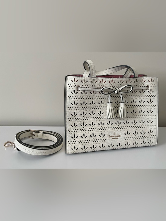 kate spade Handbags - Kate Spade White Perforated Leather Tote with Tassel Detail